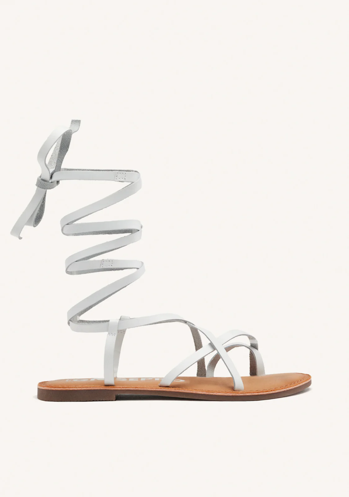 Lussat sandals with thin tan straps to tie around the leg