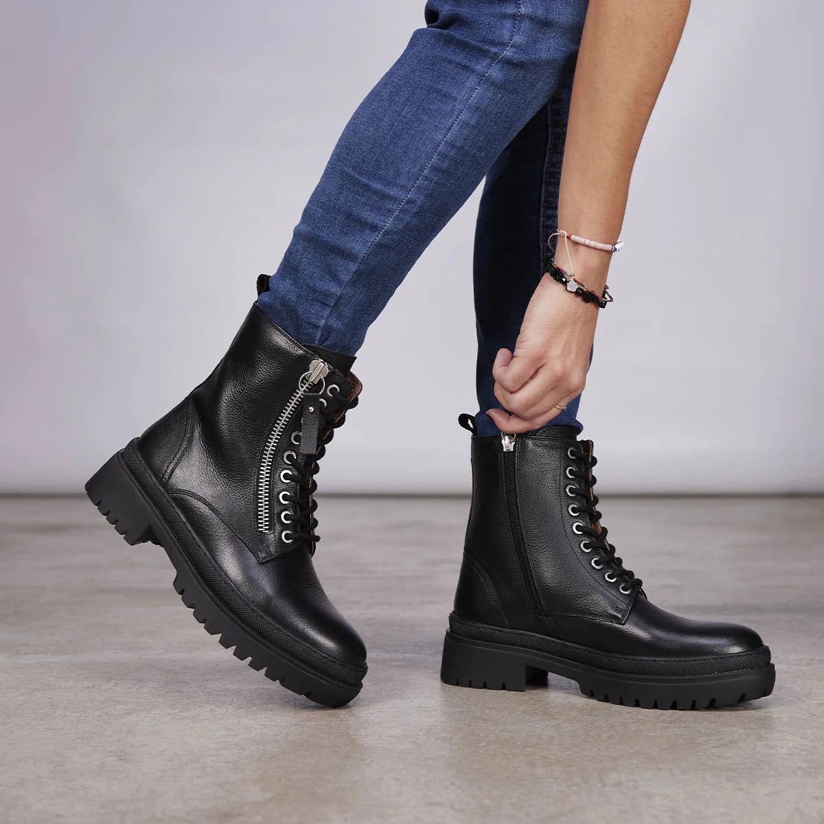 Mallaig women's black leather biker boots with track soles and a decorative metallic zip - Image 5