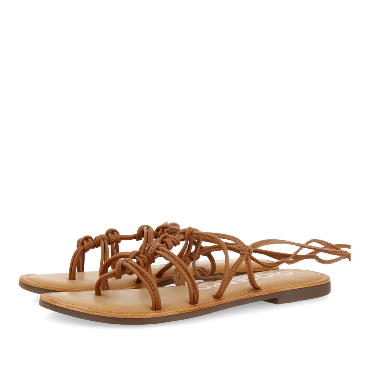 Mambai women's flat tan leather sandals with thin straps and decorative knots - Image 2